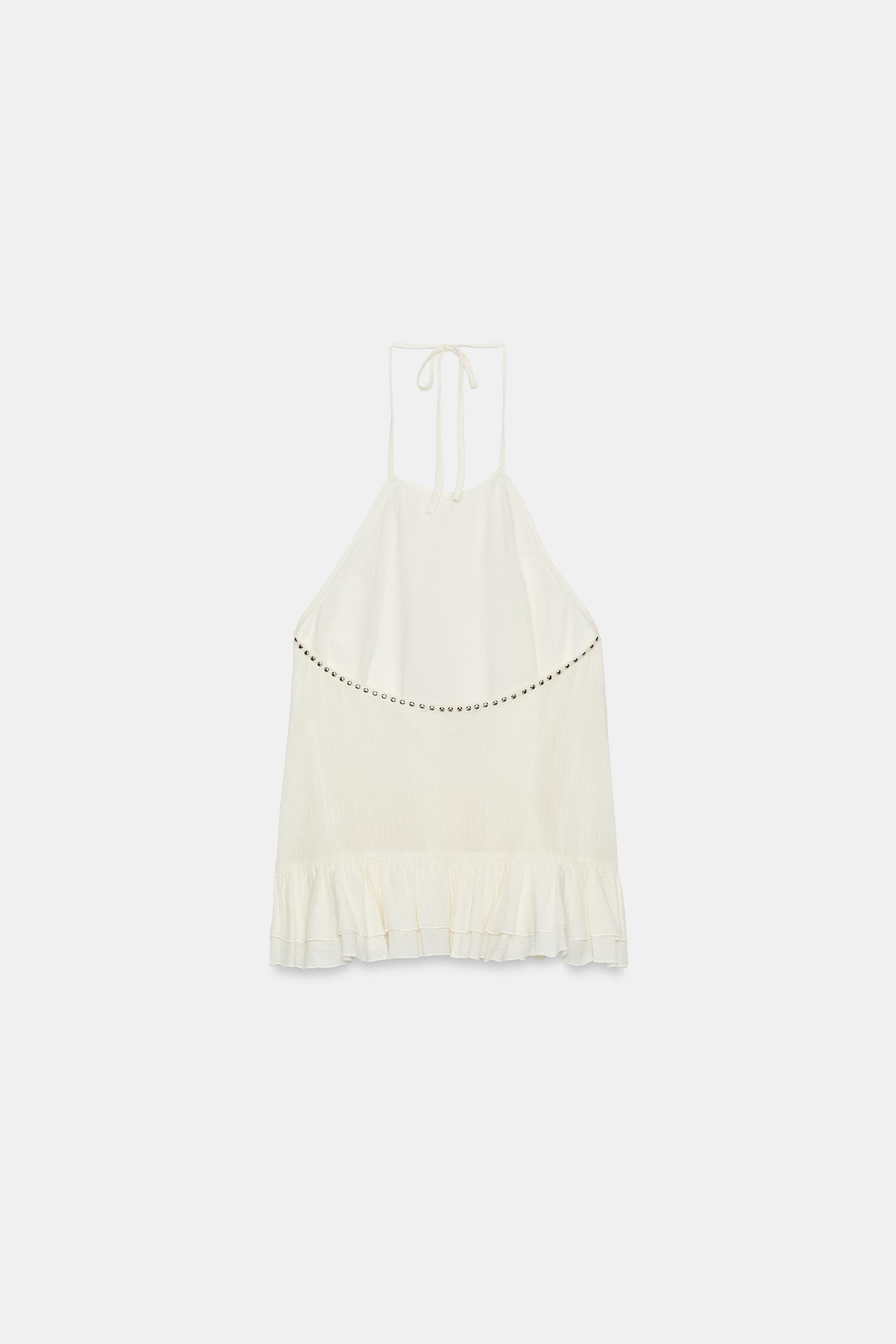 STUDDED RUFFLE HALTER TOP